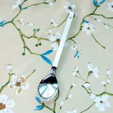 Solid Spoon With Hooked Handle