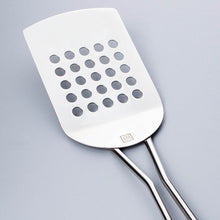 Perforated Turner with Bowed Wire Handle