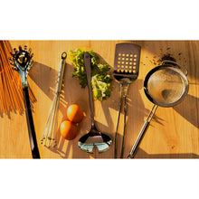 Perforated Turner with Bowed Wire Handle